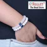 White Glass Beads Bracelet Set with Evil Eye Bead - Pack of 9 - Stretchable - Image 4